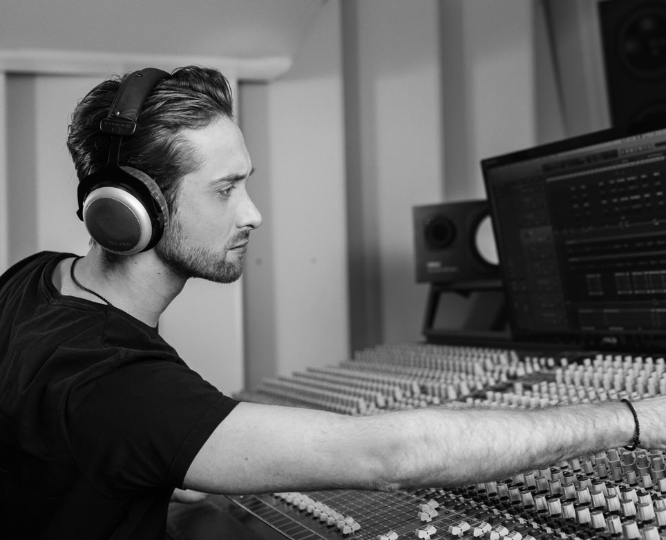 Man using Beyerdynamic DT 880 Pro Headphones in Studio